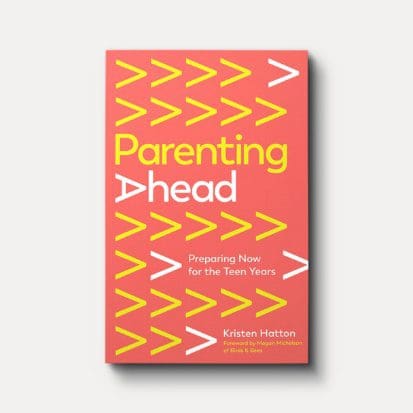 Parenting book with arrows on red cover.