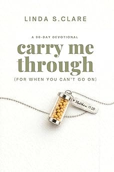 Devotional book featuring a necklace.