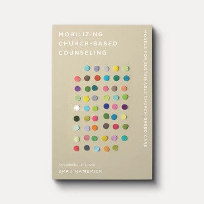 Book cover with colorful dots and text.
